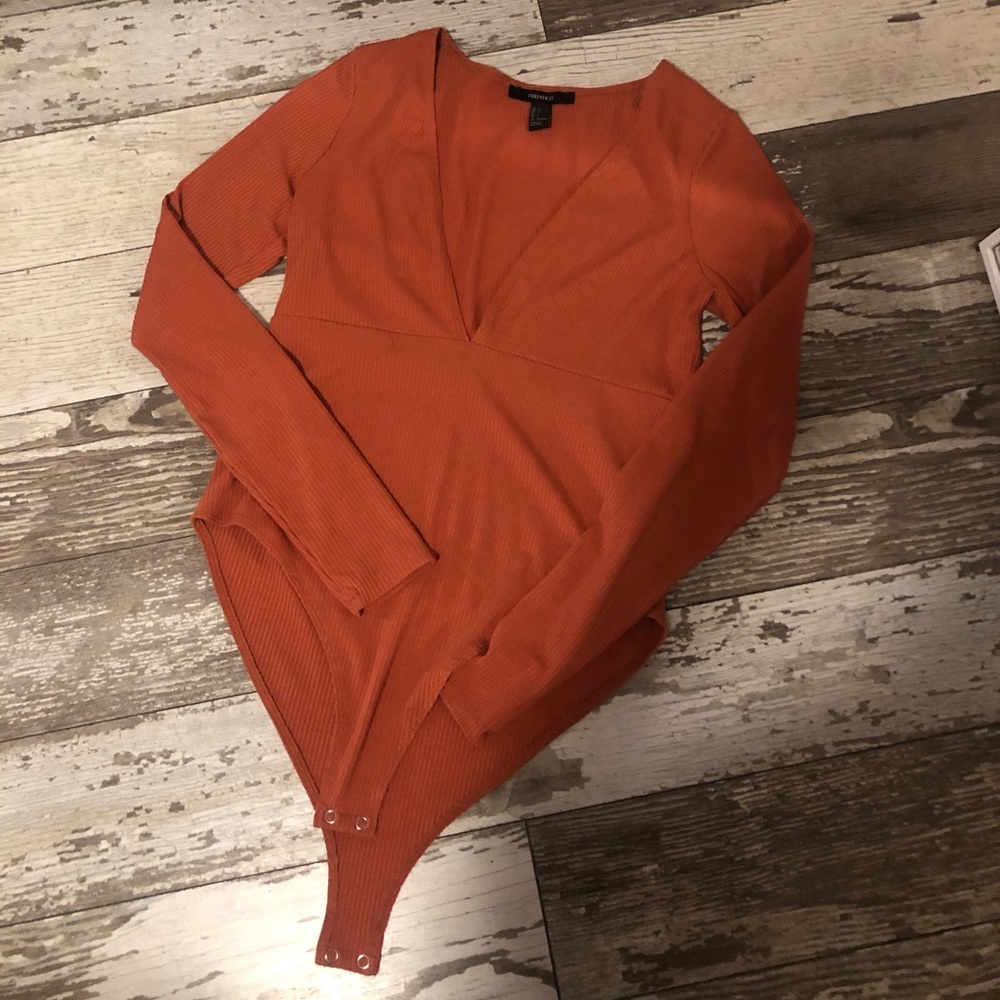 Burnt orange V neck bodysuit